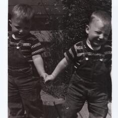 Kenton leading the way with Kevin. 2 years old. May 1954
