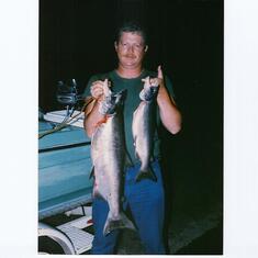 Kenton was out fishing with his fishing buddy Peto. Oct 1987