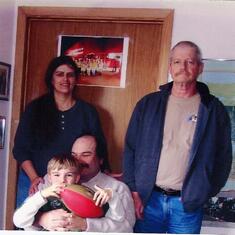 Joel B., his son Sam, Kenton and Heidi.  March 2008