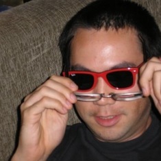 Trying out some Ray-Ban sunglasses in Oakland, Ca, 2008.