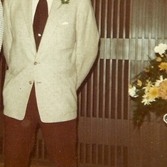 1974.     This is his 'Best Man' face.