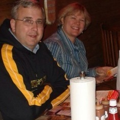 Kevin and Nancy enjoying a meal with the Inman family