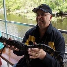 Kevin with an alligator, New Orleans, April 2013
