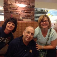 Cousins Lynne, Bernadette, and Kevin pose for a picture in the Phoenix Airport, August 2013