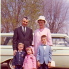Dressed in our Easter finest. This tradition of taking a family picture in the front yard has continued for over 50 years.  I challenge all of the grandkids to keep it going for the next 50!  Kevin's kids always stood still and smiled like perfect angels 