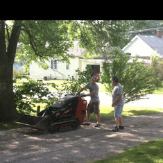 Kaleb & Kevin working the driveway at Kaleb's first house