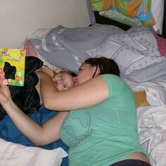 Aunt Nichelle reading to baby Noah on first trip to visit Kim