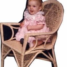 Kimberly 6 months old in wicker chair