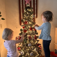 Blake & Parker decorating the tree 2023