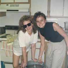 Sisters Kim & Kris preparing to host a party, Varsity Villas, Bloomington, IN 1988