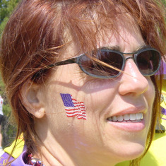 Kim closeup with flag on cheek closeup