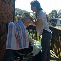 Kirsten giving dad a haircut