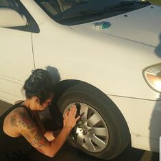 She could even change her own tire!