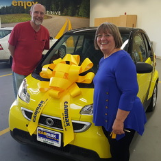 Kitty and her Smart car - yellow of course