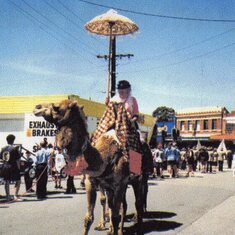 Kotha riding a Camel at a street fair 1999.