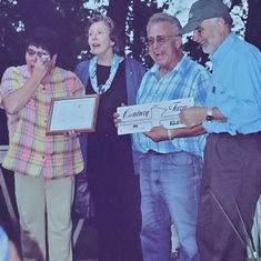 Presenting Rolf cousins with their Century Farm designation in Atwater, MN