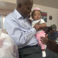 Dr. Dugbatey and his only greatgranddaughter Autumn in 2018