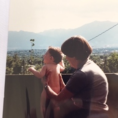 At 1 year old, post porch bath, with Gran.