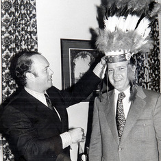 Atlanta Manager Eddie Mathews presents "a genuine Braves war bonnet" 1973