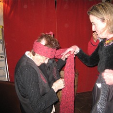Helping Mama into costume for the three kings celebration, Jan 2013
