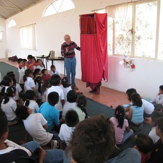 Performing inside a "theatre du sac" Tepoztlan MX Feb 2011. Notice Laia's feet at the bottom of the theater. She sould walk around but since she couldn't see anything I would have to guide her. The kids in this orphanage were entranced by this strange wal