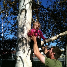 First time "climbing" a tree with Dad