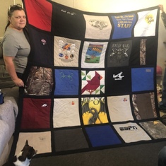 This is the quilt Mrs. Smith made me out of your t-shirts. I love it.  