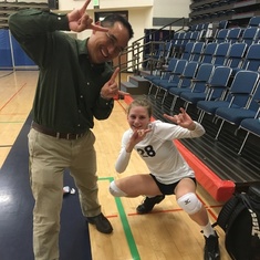 Mr. Berroya at my UCSC volleyball game holding up our "Go Slugs" hand signal.