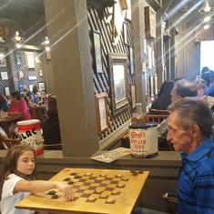 Dad & Sarah enjoying a game of checkers