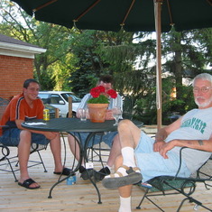 Relaxing on the deck with the family, about 2004.