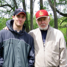 Micho and Larry on a very cold canoe race, about 2009, wearing his beloved China Marine hat