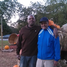 Jamell with his dad at the pumpkin patch