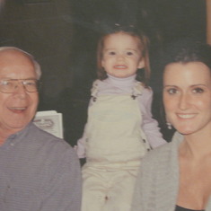 Grandpa with granddaughter Shae and daughter-in-law Melanie.