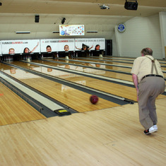 dad bowling a strike