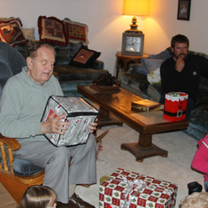 Dad opening Christmas present