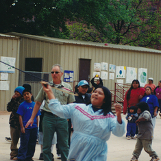 Teaching Havasupai children how to throw atlatl. Earth Day 1999. 