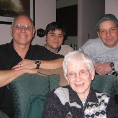 Larry, son Jesse, and brother Mark with Mom