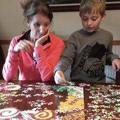 Beckett helping Laura on puzzle winter of 2018
