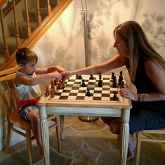 Beckett learning chess from Laura