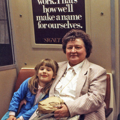 Laura with her Grandma (Ruth) Hill riding Metro