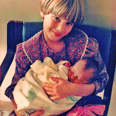 Laura holding her brother Woody (Wendell III), just born on Oct 23, 1987