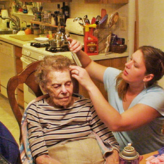 Laura helps Sarah Freeman with her hair (April 2010)