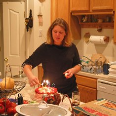 Laura lights her cake for Woody's 17th birthday at Grandma Hill's home (Oct. 2004)