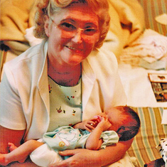 Grandma Arkebauer holds newborn Laura