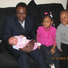 With grand kids: Jaden, Hannah, Esther