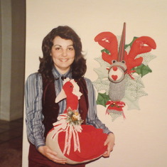 Larry's daughter, Anita, with her hand-made crafts