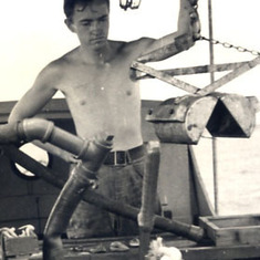 Larry at Little Egg Harbor aboard workboat (1950)