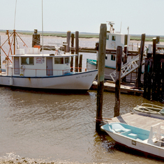 Boats at Marsh Landing June 1979 - the Spartina, with Kit Jones on the other side, and small motor b