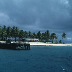 Japtan Island - bldgs & dock to which Alpha Helix is moored. Symbios Expedition 1971. LRP photo.  Sea Story #5