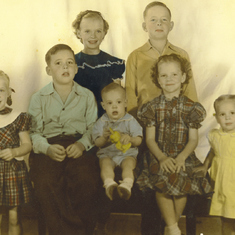Margaret, Lawrence, Dot, Tommy, Steve, Ann, Mollie 1949 Christmas picture.